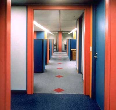blue and red door with carpet and red triangle